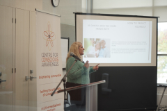 Speaker-side-view-behind-glass
